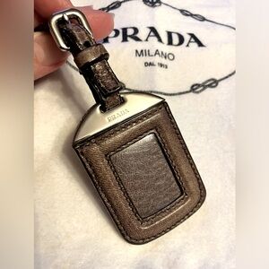 Authentic Prada luggage tag brown leather silver hardware gently used.